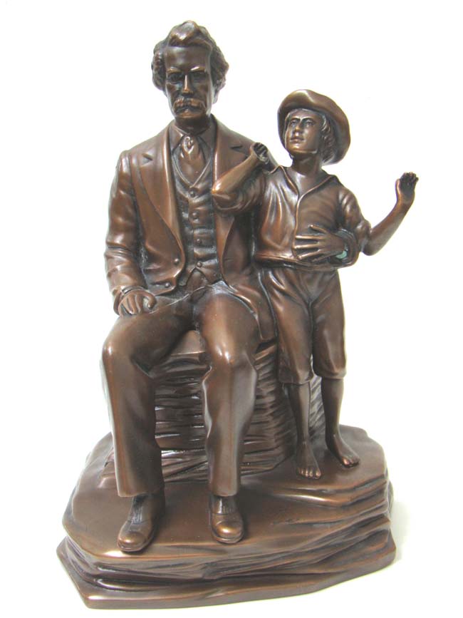 A fine and RARE pair of Antique Bookends by Jennings Brothers circa 1936 depicting MARK TWAIN and Huckleberry Finn.